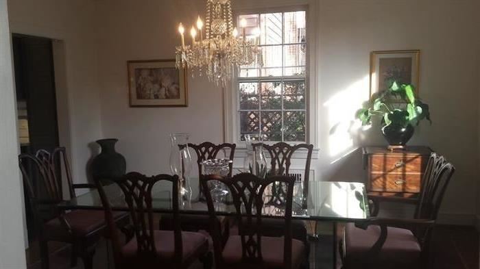 Dining room furniture: large all-glass table with 6 centennial Chinese Chippendale chairs