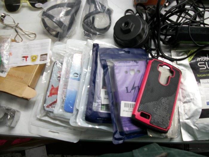 Large lot of misc ink cartrages, phone cases and m ...