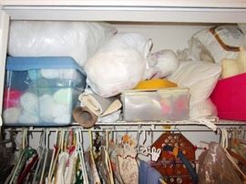 Bins and bags of skeins of yarn and wool