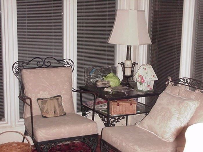 Woodard wrought iron arm and side chair with square wrought iron table between, oak leaf motif