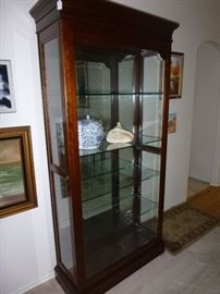 Cherry wood curio cabinet