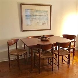 Scandinavian teak dining table with draw leaves and 6 chairs