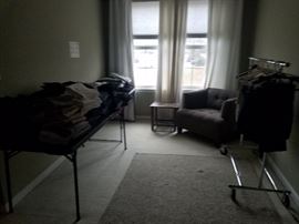 Great grey oversized chair, end table, contemporary area rug, MANY high end jeans, shorts,  ( Lucky, NYDJ... )