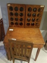 Vintage slant-front desk/ chair shown with 2 wine racks on top