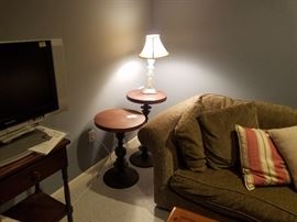Wood top, metal base stands, glass lamp, LCD tv on single drawer side table