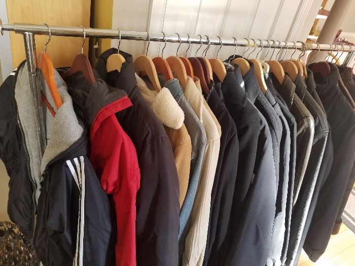 Rack full of contemporary leather and down and more outerwear jackets- Calvin Klein, Eddie Bauer, Territory Ahead, Adidas, 