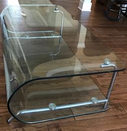 This is a unique glass cocktail table from the Merchandise Mart; goes well with modern decor