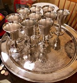 Silver goblets and tray