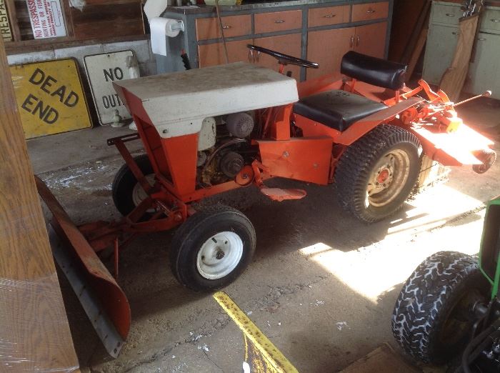 Tractor with blade and lawn mower..$300