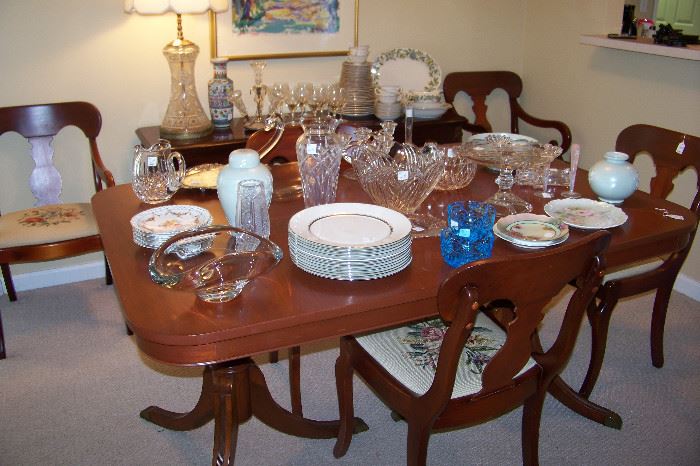 Duncan Phyffe table (has two leaves) shown with a set of 6 mahogany Empire style chairs with needlepoint seats