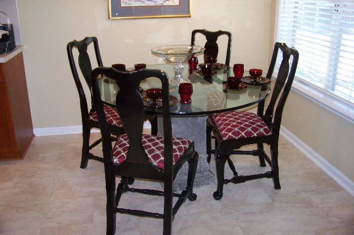 Glass top kitchen table,  shown with set of 5 black laquered chairs (5th chair is in the small office)