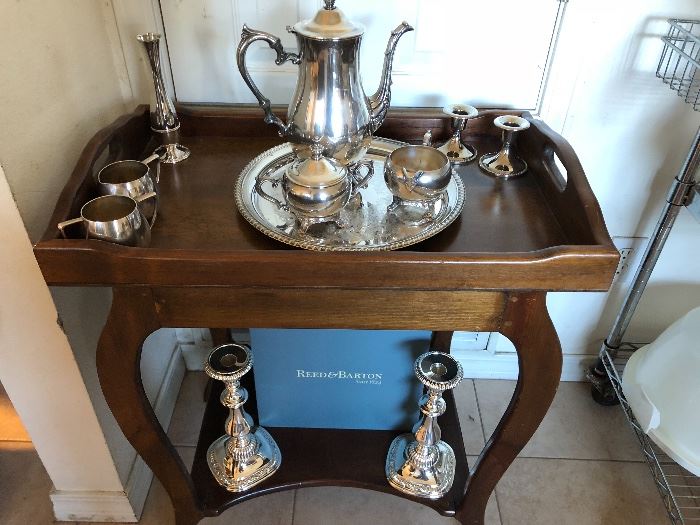 Stainless silver complete tea service set.  
New Stainless  silver candle holders. 