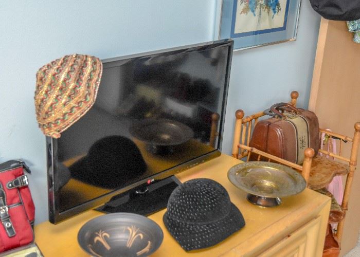 Flat Screen TV, Pottery Bowl, Women's Hat, Brass Pedestal Dish