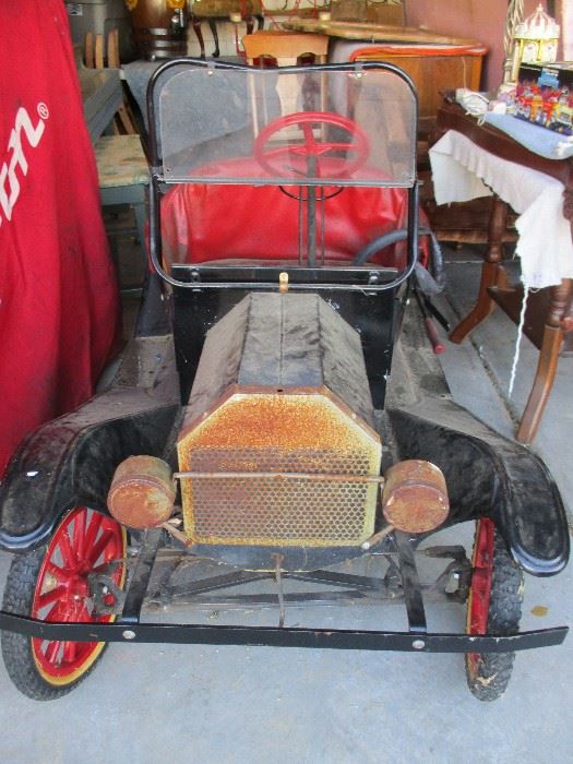 Child's gas powered Model T built in the early 60's.  Original parts and it runs.
