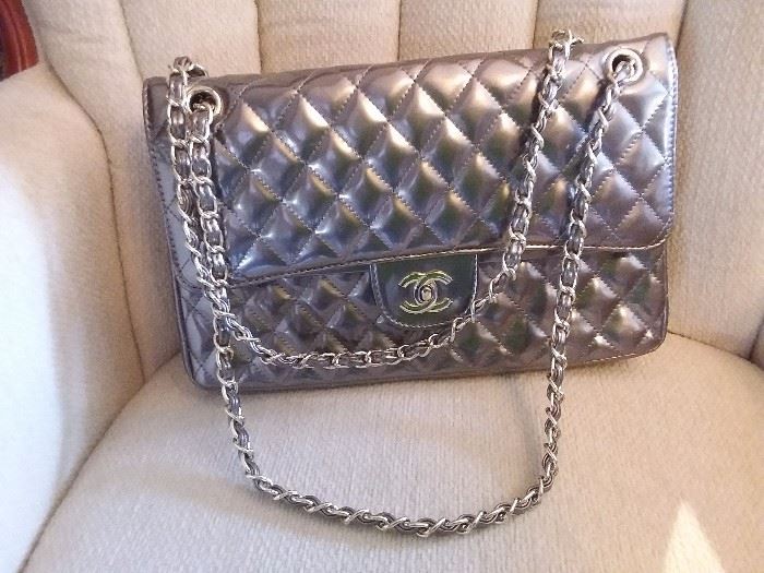 Auth CHANEL quilted CC double flap. Sold on ebay for $2100.00 up to $2600.00.