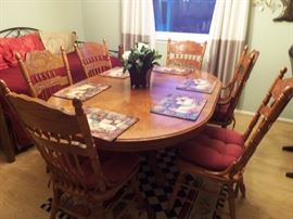 Oak pedestal dining/kitchen table (shown w/leaf)