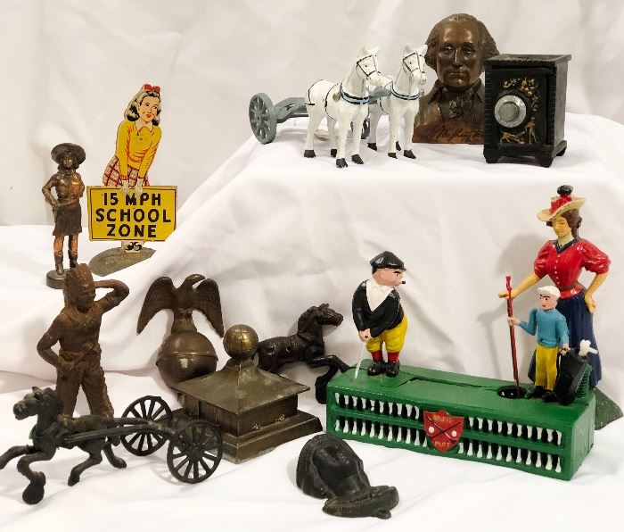 Cast iron banks and toys.  Collectible metal figurines and doorstops.