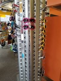 73' tall sun/glasses rack on wheels...