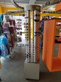 73' tall sun/glasses rack on wheels...