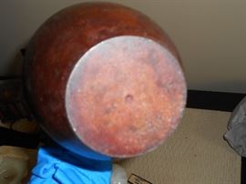 Bottom of metal vase