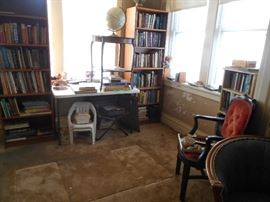 Bookcases, Victorian table, vintage chair, tons of books