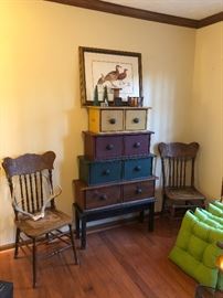 pr, antique oak chairs, antlers, stacked chest, bird picture, outdoor cushions