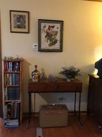 vintage suitcase,bookcase with books, console table, Scotland map picture