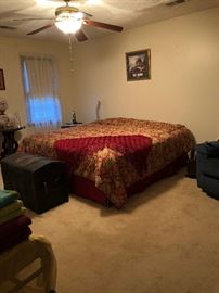 antique trunk, king bed, king bedding, picture