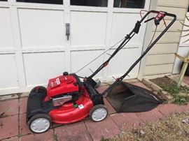 Toro self-propelled electric start mower.