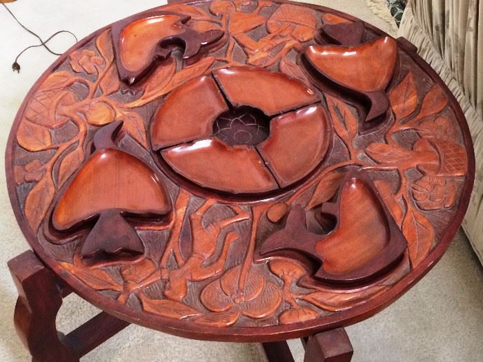 unusual table with serving insets from the Phillipines
