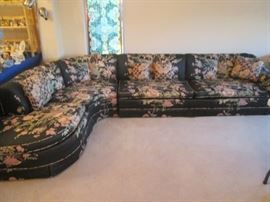 Large Sectional with Chaise End Unit.  Dark fabric with floral motif.