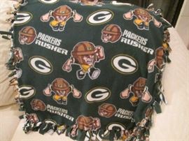 Man of the House played for the Green Bay Packers in the 1940's.  We have some memorabilia.  This is a 30" fringed piece of fabric and we have 2 pieces.