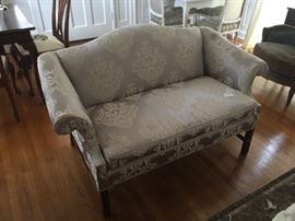 ONE OF TWO MATCHING LOVESEATS