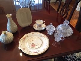 Royal Doulton china (8 place settings $25 each includes dinner plate, dessert plate, cup and saucer), Lennox pieces ($15 ea or best offer) and crystal  (cream and sugar set $20, covered cheese plate $30 obo); more crystal shown in dining hutch picture.