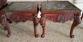 Two carved end tables