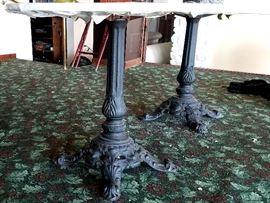 Oval table has two heavy cast iron bases