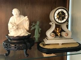FIGURES AND SWINGING CLOCK
