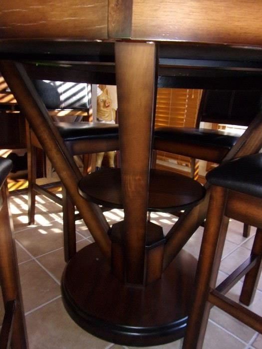 1 year old Round pub height table and unique pedestal with four pub height chairs and buffet