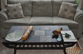 Stanton (manufactured in Portland) sofa and love seat in celery sage green, gardening books, slate coffee table and matching end tables