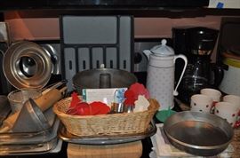 Baking supplies, vintage kitchen items, cookbooks, cookie cutters, coffee mugs, Black & Decker coffee maker
