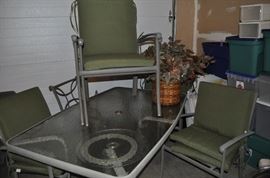 Large rectangular patio table and 6 chairs with removable pads