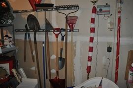 Gardening tools, hose and hose reel, potting supplies, yard art, potting soil, pots, and more