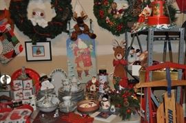 Christmas -- don’t pack it all up yet -- just make room for more, Christmas set of china Noel pattern, Christmas Village from Frederick and Nelson, snowmen, sled, wreaths, 7 foot tree in box, Christmas wrapping supplies, and more!