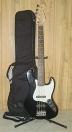 Fender Electric Guitar w/Stand, Case, & Fender Amp.