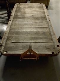 Gates Rubber Company cart - orange iron pull and wheels