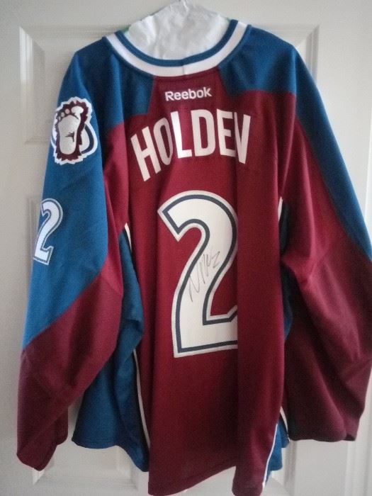 Colorado Avalanche autographed jersey  (actually worn in game!)(has the snap on the inside to secure to rest of uniform)