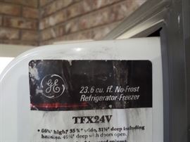 23 GE cubit ft. Side by side in working condition 