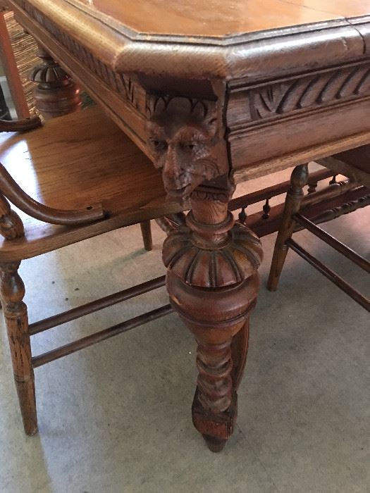 Circa 1870's , this magnificently carved oak table has a beautiful stretcher base and is made of solid wood.