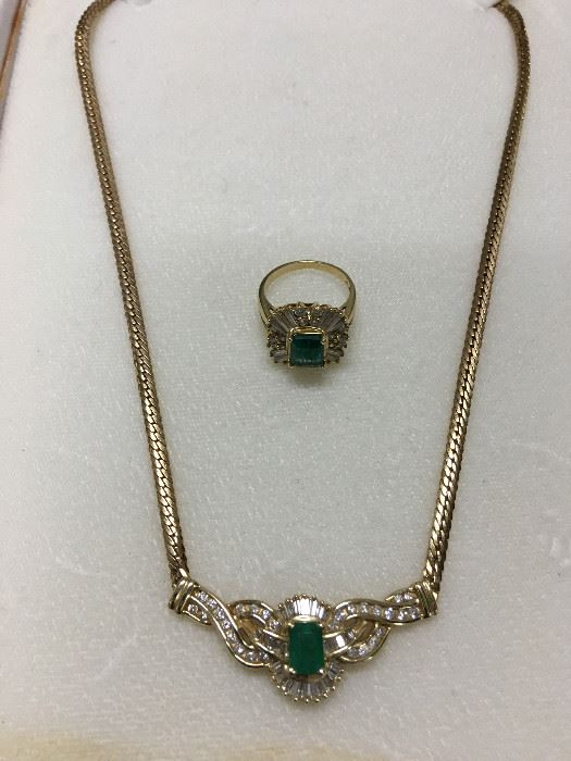 This is just a sample of the elegant jewelry being offered. This necklace has 1 carat total of diamonds and a 1 carat A quality emerald set in 14kt gold.