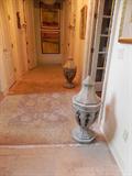 ARCHITECTURAL PIECES EVERYWHERE AS WELL AS GREAT ORIENTAL RUGS OF ALL SIZES